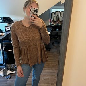 Leopard print peplum style top